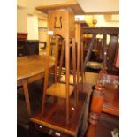 Near pair of oak Arts and Crafts jardiniere stands