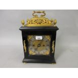 Small 18th Century ebonised and gilt brass table or bracket clock, the gilt basket top and acorn