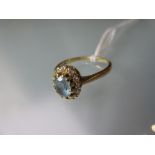 18ct Yellow gold oval aquamarine and diamond ring Size M