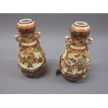 Pair of late 19th/early 20th Century Satsuma baluster form two handled vases decorated with panels