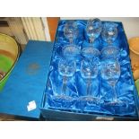 Two sets of boxed Thomas Webb crystal drinking glasses together with a similar boxed decanter