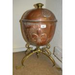 Art Nouveau brass and copper coal container of Arts and Crafts design decorated with a Tudor rose