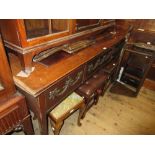 George III mahogany side table in Adam style, the moulded top above three frieze drawers relief