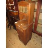 French Art Deco oak bedside cabinet having single door glazed top above a single drawer and