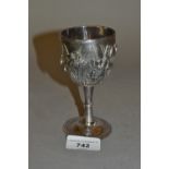 Japanese white metal goblet, the bowl heavily embossed with Iris, with character mark to base and