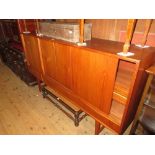 Mid 20th Century teak sideboard together with a teak extending dining table