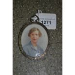 20th Century pewter framed oval portrait miniature head and shoulder portrait of an elderly lady,