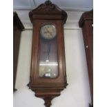 Late 19th / early 20th Century walnut cased Vienna wall clock, the gilt dial with Arabic numerals,