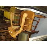 20th Century oak, elm and beech bow back smokers chair on heavily turned supports with stretchers