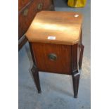 Edwardian mahogany work box having inlaid decoration on four reeded tapering supports with brass bun