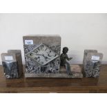 Art Deco beige and grey flecked marble mantle clock of rectangular form, gold painted spelter figure
