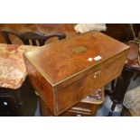 Large early 19th Century figured walnut brass mounted fold-over writing slope with a fitted interior