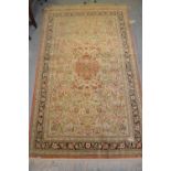 Indo Persian silk rug having central medallion with all-over floral design on a beige ground