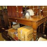 Victorian rectangular mahogany kitchen table on turned tapering supports with brass casters