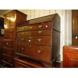 18th Century oak bureau, the fall front enclosing a fitted interior with well above two short and