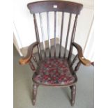 Reproduction stained pine and beechwood slat back farmhouse kitchen chair together with a carved oak