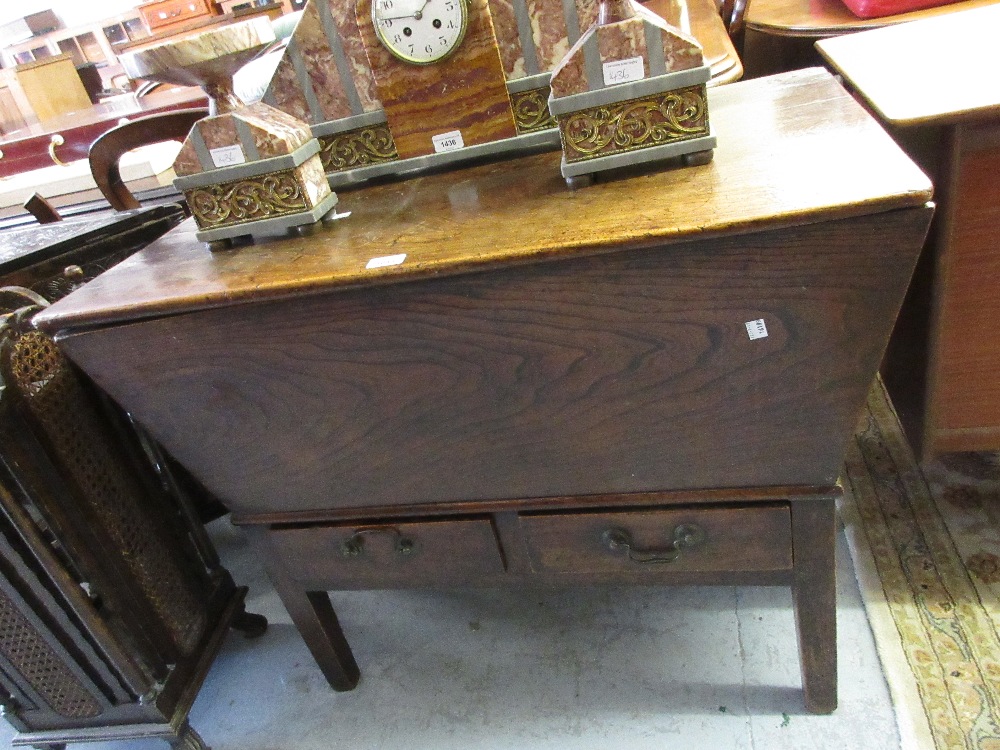 18th Century oak dough bin, the plank hinged top above two short drawers with brass swan neck