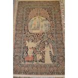 Indo Persian silk rug, the central panel of figures having all-over floral design on a black