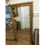 Large reproduction rectangular gilt framed bevelled edge wall mirror