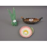 Sylvac green pottery figure of a long eared rabbit, together with a Carlton ware dish and a Wade