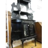 Edwardian ebonised mirror back chiffonier with a two door base on cabriole supports