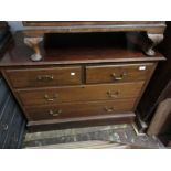 Early 20th Century mahogany straight front chest of two short and two long drawers with brass