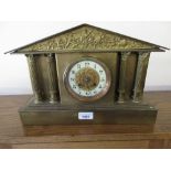 19th Century French gilt brass cased mantel clock of neo classical design with a relief frieze above