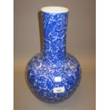 Large Chinese porcelain bottle vase, all-over floral decorated in blue and white In good