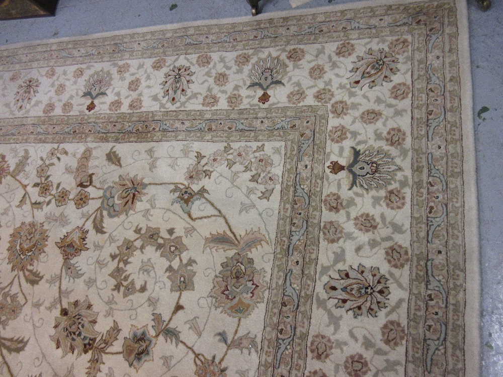 Indo Persian style carpet of all-over floral design with multiple borders on a beige ground, 9ft - Image 2 of 3