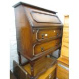 Early 20th Century oak bureau together with a similar bookcase with leaded glass doors