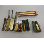 Gold mounted cheroot holder together with a quantity of other cheroot holders