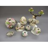 Late 19th Century porcelain floral encrusted ball form vase together with six other similar vases