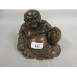 Heavy oriental carved hardwood figure of a seated Buddha