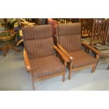 Guy Rogers, pair of mid Century teak open armchairs These do not recline.