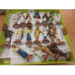 Collection of Indian clay figures with handpainted finish, some bearing pencil signatures to