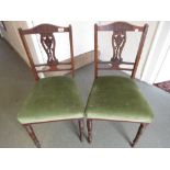 Set of four Edwardian mahogany marquetry inlaid side chairs