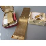 Dunhill gold plated cigarette lighter in original box, Ladies gold plated wristwatch by Castle