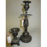 Regency brown patinated bronze figural candlestick, together with another Regency bronze candlestick