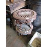 Two cast iron garden tables on lions paw feet 13ins high each