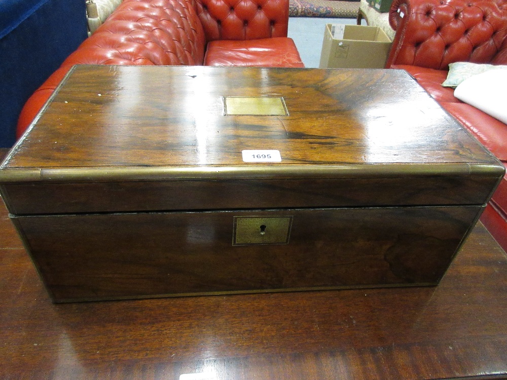 Victorian figured walnut and brass bound rectangular fold-over writing slope, the fitted interior