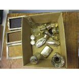 Three various small silver photograph frames (at fault), various silver mounted dressing table