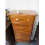 20th Century French cherry wood semainier , the moulded parquetry inlaid top above seven drawers