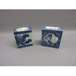 Two Chinese rectangular porcelain pillows decorated in blue and white with dragons and flowers (