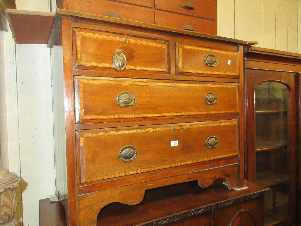 Edwardian mahogany and satinwood crossbanded chest of two short and two long drawers