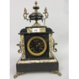19th Century black slate and marble mantel clock with urn surmount, with a two train movement
