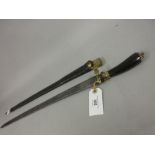 Antique hunting sword with engraved steel blade and brass mounted horn grip Slight pitting to blade,