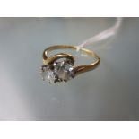 Yellow gold two stone diamond crossover ring