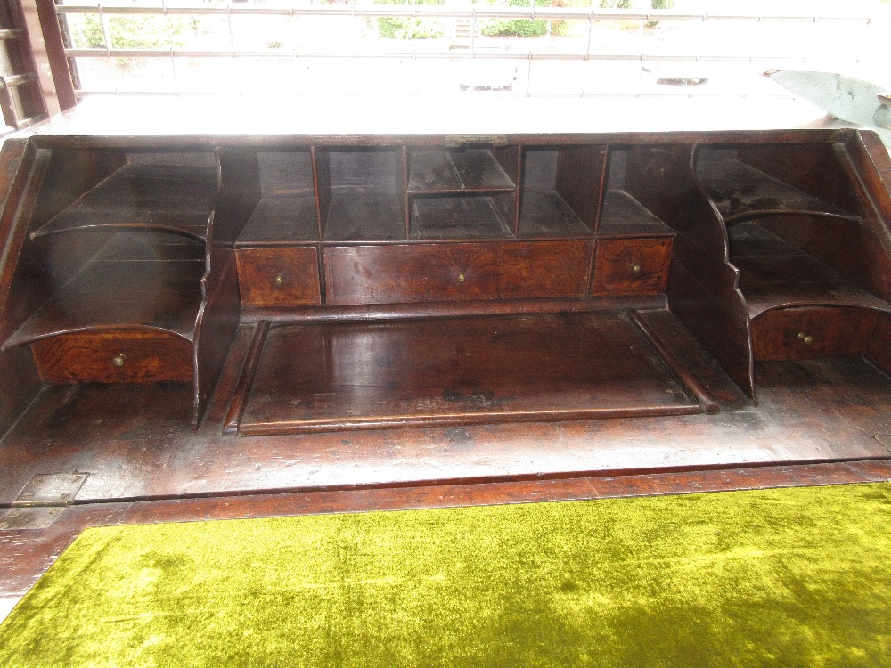 Early 18th Century walnut and herringbone crossbanded bureau, the fall front enclosing a fitted - Image 11 of 12