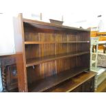 Floor standing three shelf open bookcase with shaped top, pair of 1930's oak slat back dining chairs