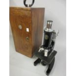 C. Baker of London, black japanned and chrome microscope, No. 38876 in original mahogany carry case